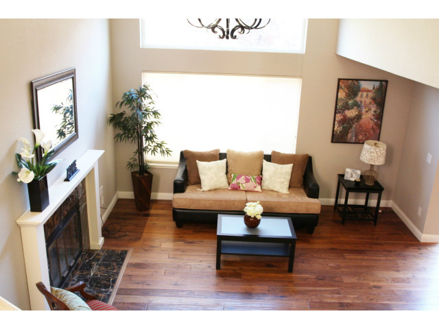 712 Superior Road Milpitas, CA 95035 - Photo 2 of 20 a living room with furniture and a potted plant
