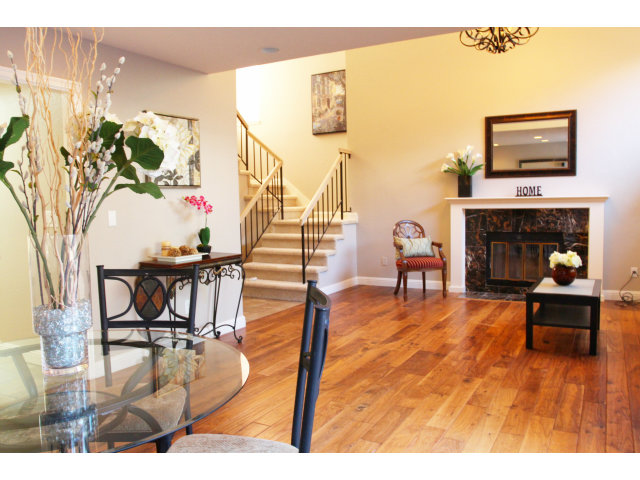 712 Superior Road Milpitas, CA 95035 - Photo 4 of 20 a living room with furniture and a fireplace