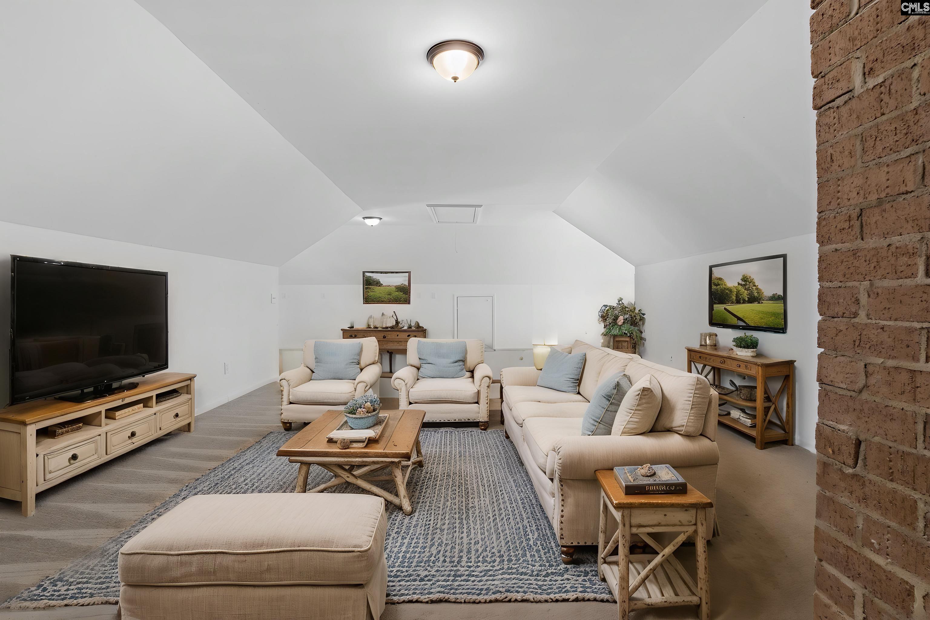 115 Rocky Ridge Road Leesville, SC 29070 - Photo 35 of 51 a living room with furniture and a flat screen tv
