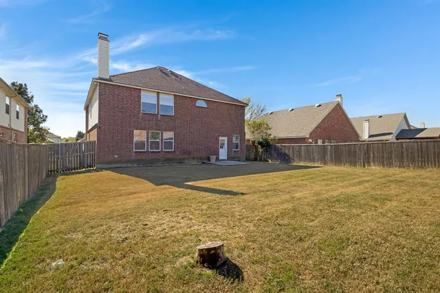 a front view of a house with yard