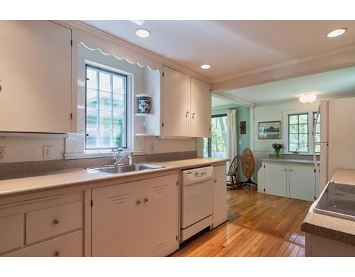 37 Downing Street Hingham, MA 02043 - Photo 11 of 20 a kitchen with sink and mirror