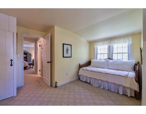 37 Downing Street Hingham, MA 02043 - Photo 14 of 20 a spacious bedroom with a bed and a dresser