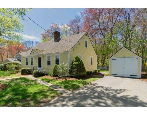 37 Downing Street Hingham, MA 02043 - Photo 18 of 20 a front view of a house with a yard and garage