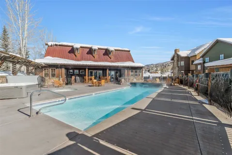 a outdoor living space with furniture and a fireplace