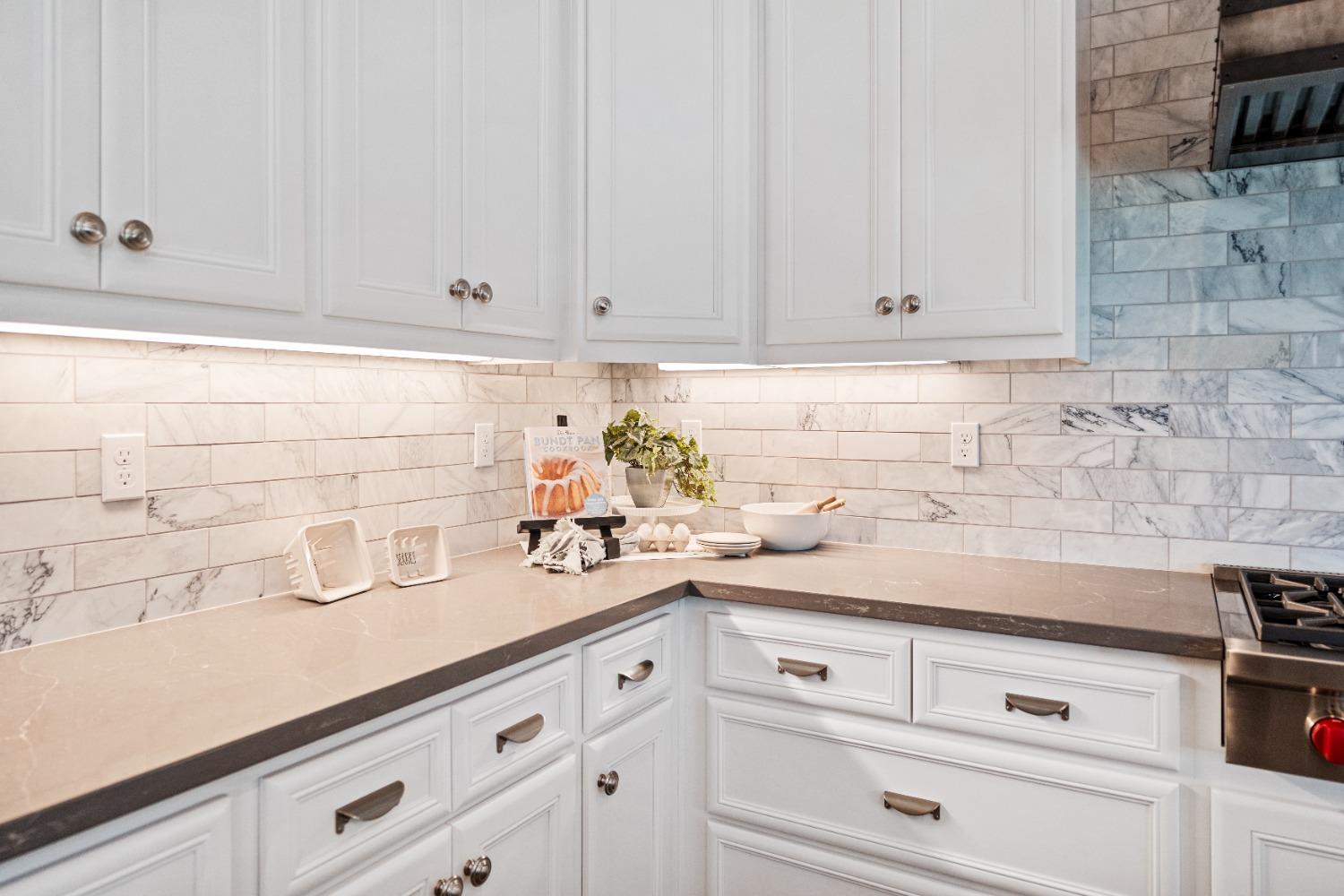 1754 Lester Avenue Clovis, CA 93619 - Photo 18 of 59 a kitchen with white cabinets and sink