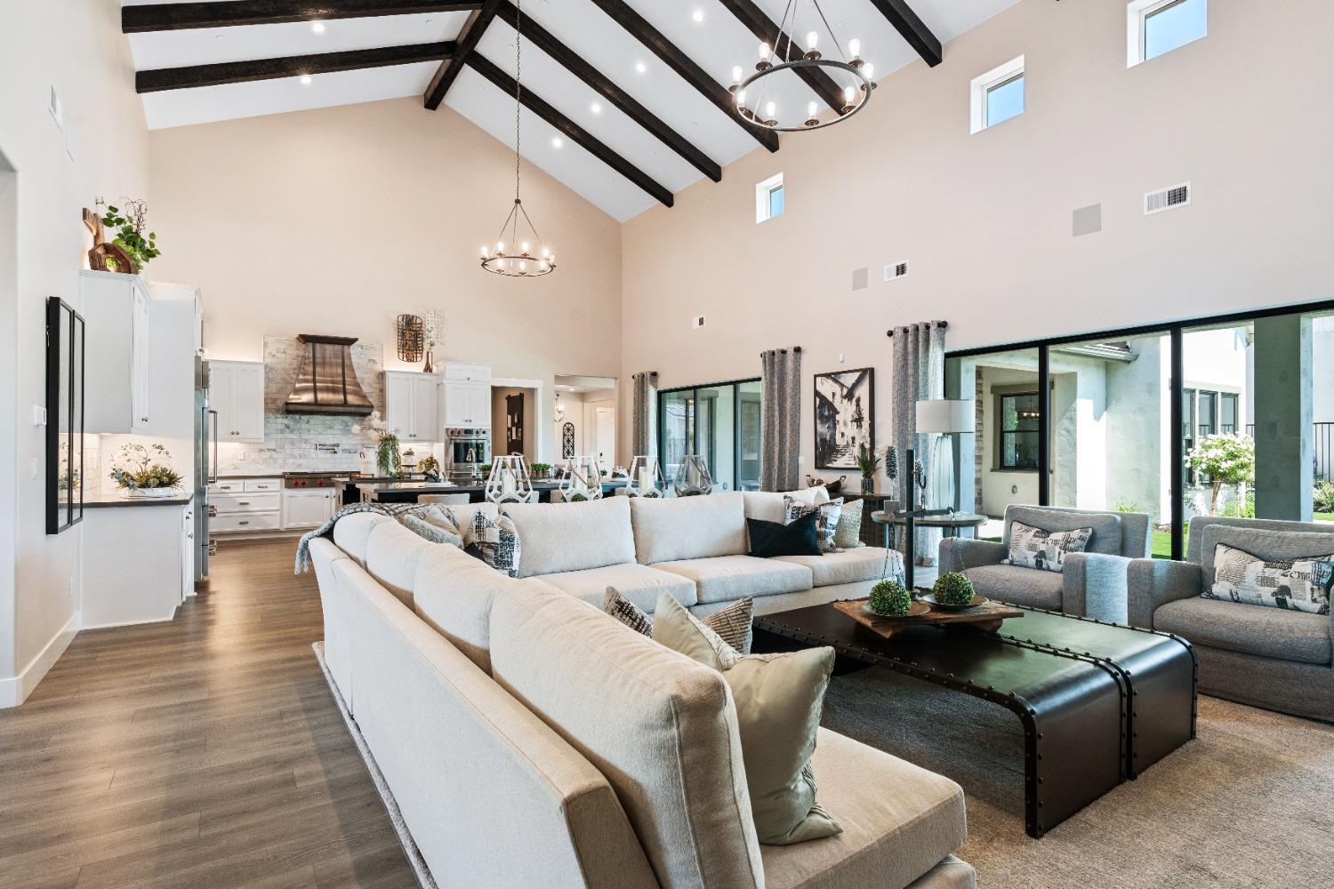 1754 Lester Avenue Clovis, CA 93619 - Photo 24 of 59 a living room with furniture wooden floor and a large window