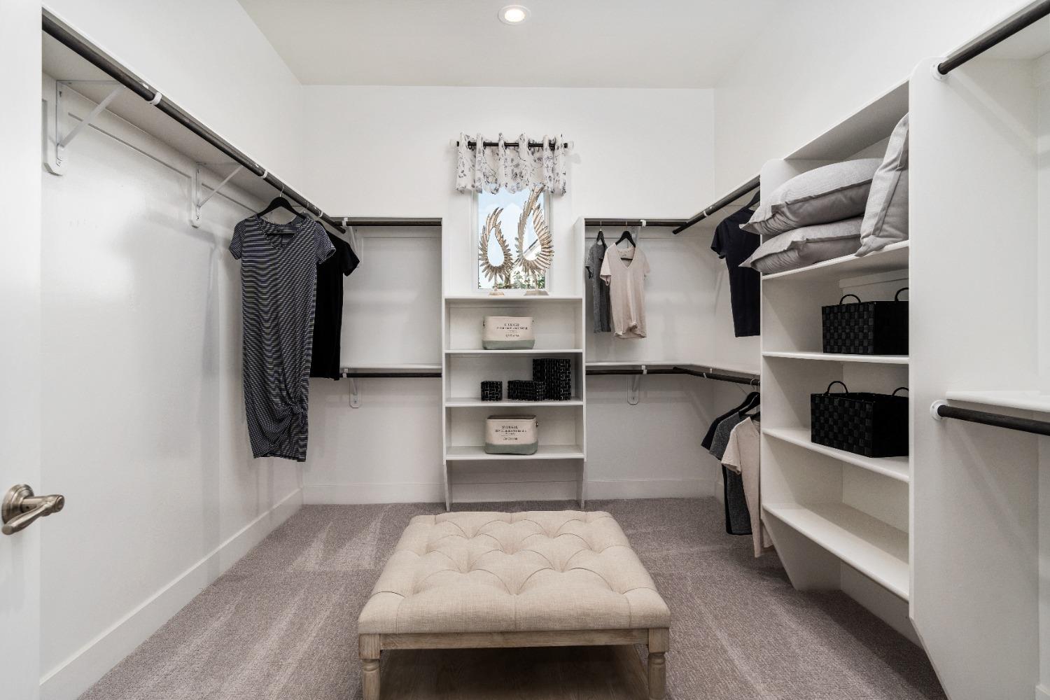 1754 Lester Avenue Clovis, CA 93619 - Photo 39 of 59 a kitchen with stainless steel appliances kitchen island granite countertop a refrigerator and a stove