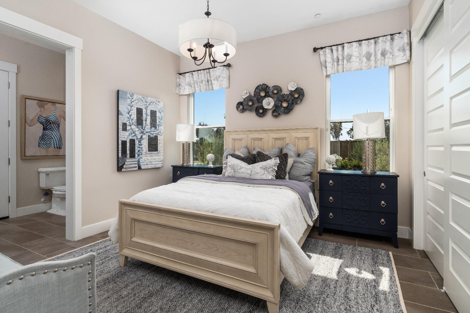 1754 Lester Avenue Clovis, CA 93619 - Photo 40 of 59 a bedroom with a large bed and a window