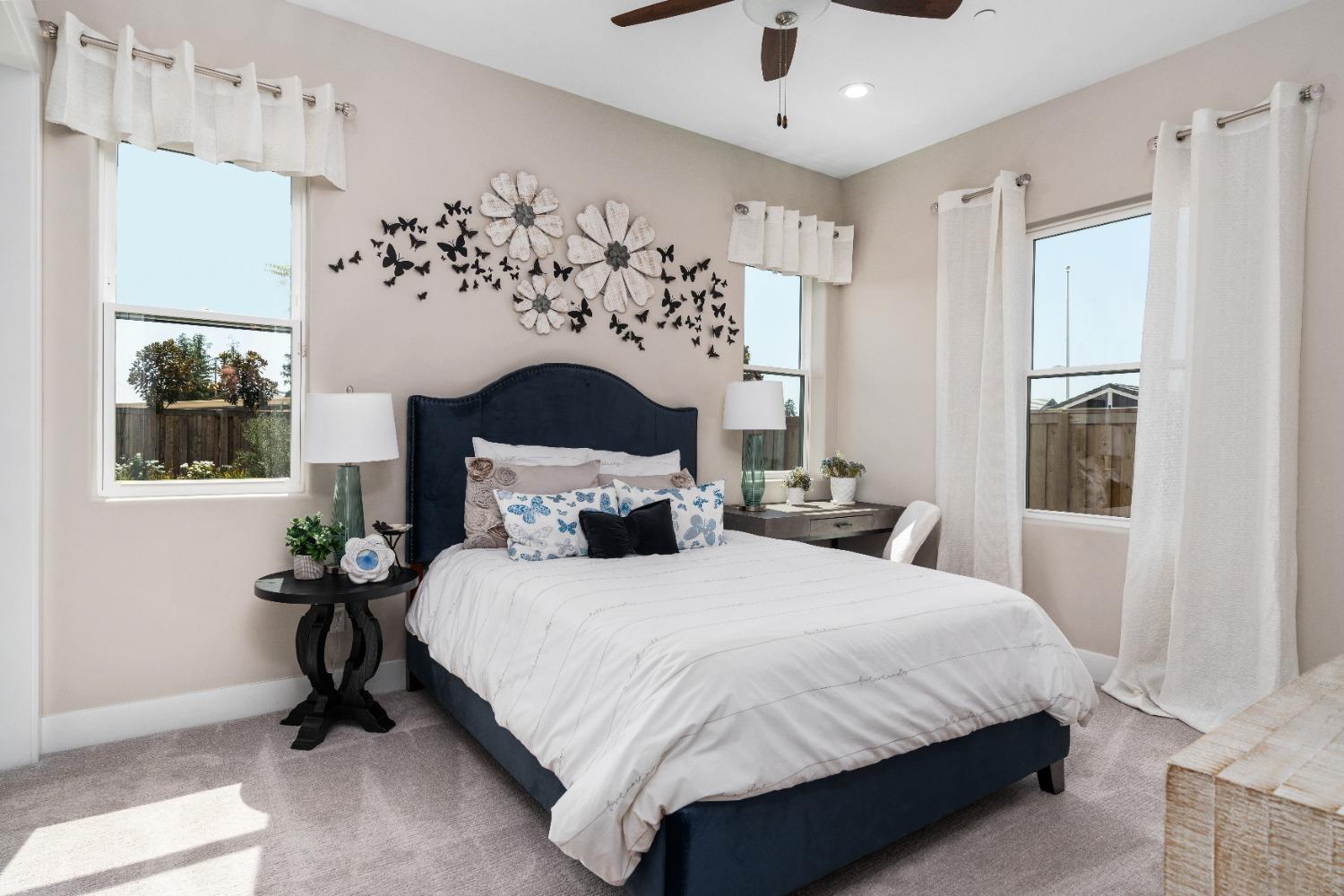 1754 Lester Avenue Clovis, CA 93619 - Photo 44 of 59 a bedroom with a bed and a window