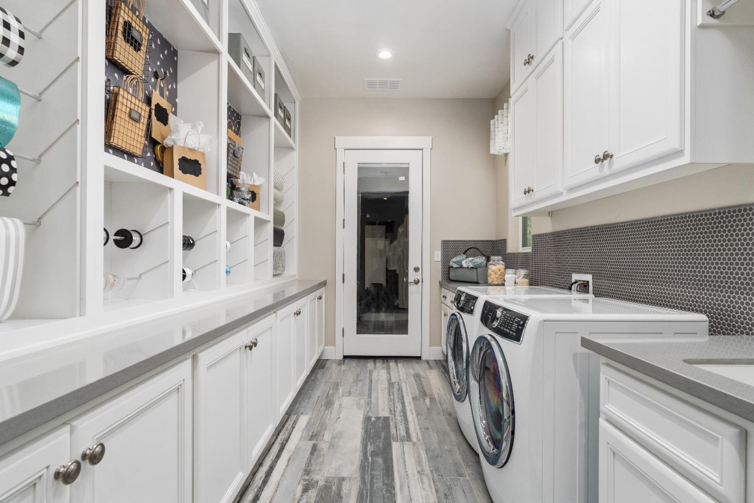 1754 Lester Avenue Clovis, CA 93619 - Photo 48 of 59 a utility room with dryer and washer