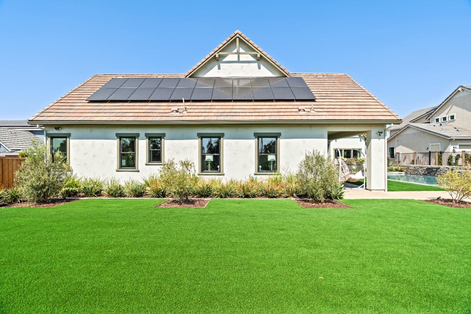 1754 Lester Avenue Clovis, CA 93619 - Photo 59 of 59 a front view of a house with a yard and porch