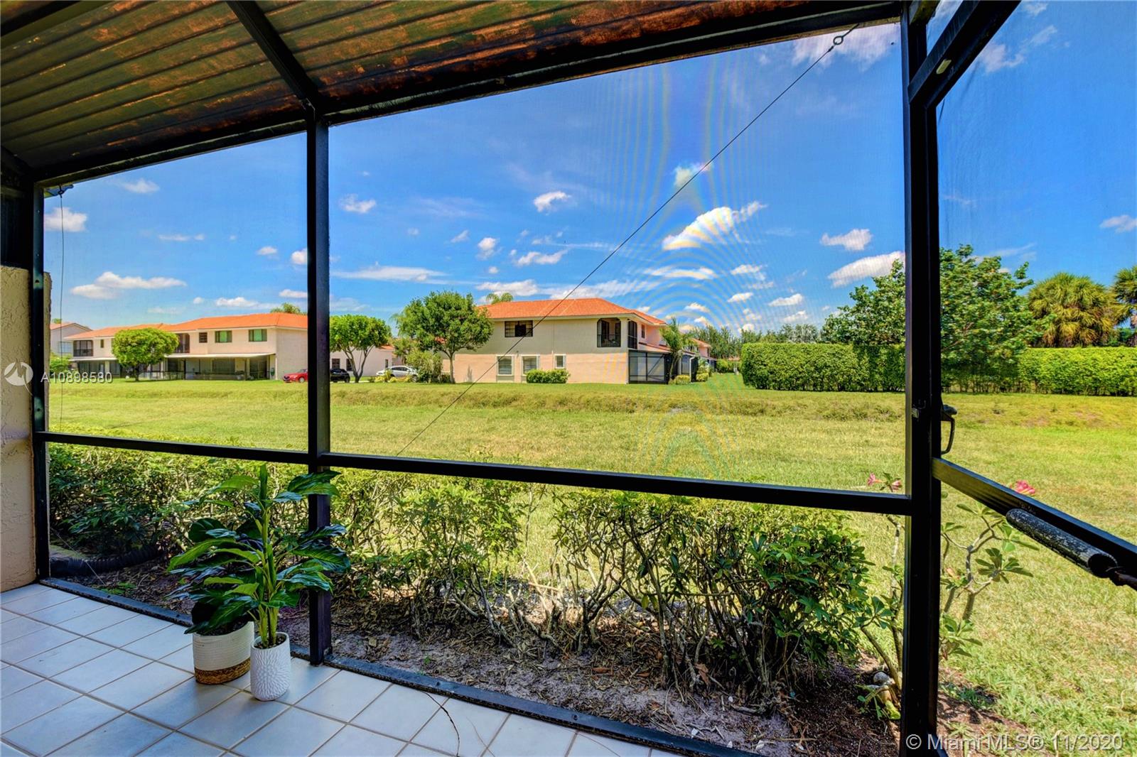 8617 Sunbird Place, Unit B Boca Raton, FL 33496 - Photo 15 of 41 a view of a city from a balcony