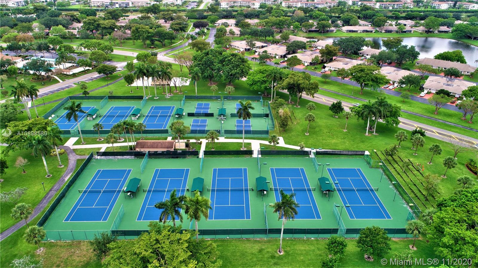 8617 Sunbird Place, Unit B Boca Raton, FL 33496 - Photo 24 of 41 an aerial view of swimming pool yard and outdoor seating