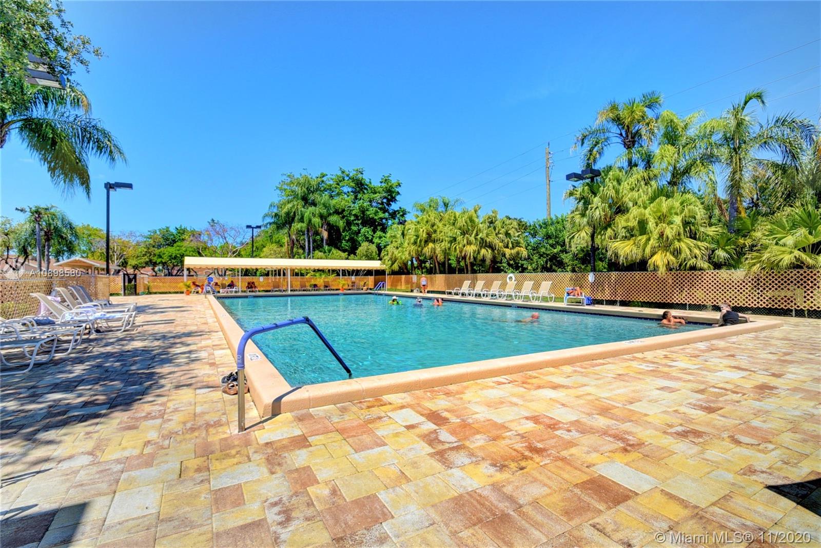 8617 Sunbird Place, Unit B Boca Raton, FL 33496 - Photo 25 of 41 a view of swimming pool with a patio