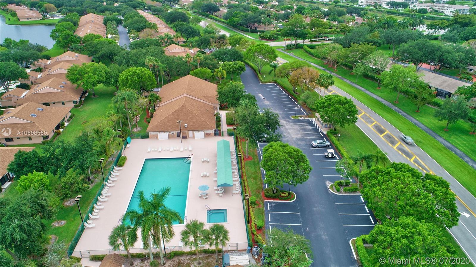8617 Sunbird Place, Unit B Boca Raton, FL 33496 - Photo 28 of 41 an aerial view of house with yard