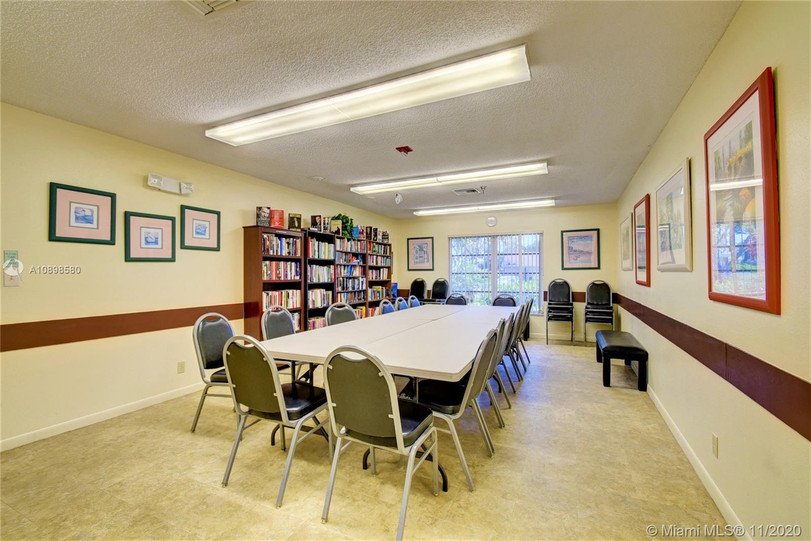 8617 Sunbird Place, Unit B Boca Raton, FL 33496 - Photo 30 of 41 a view of a dining room with furniture