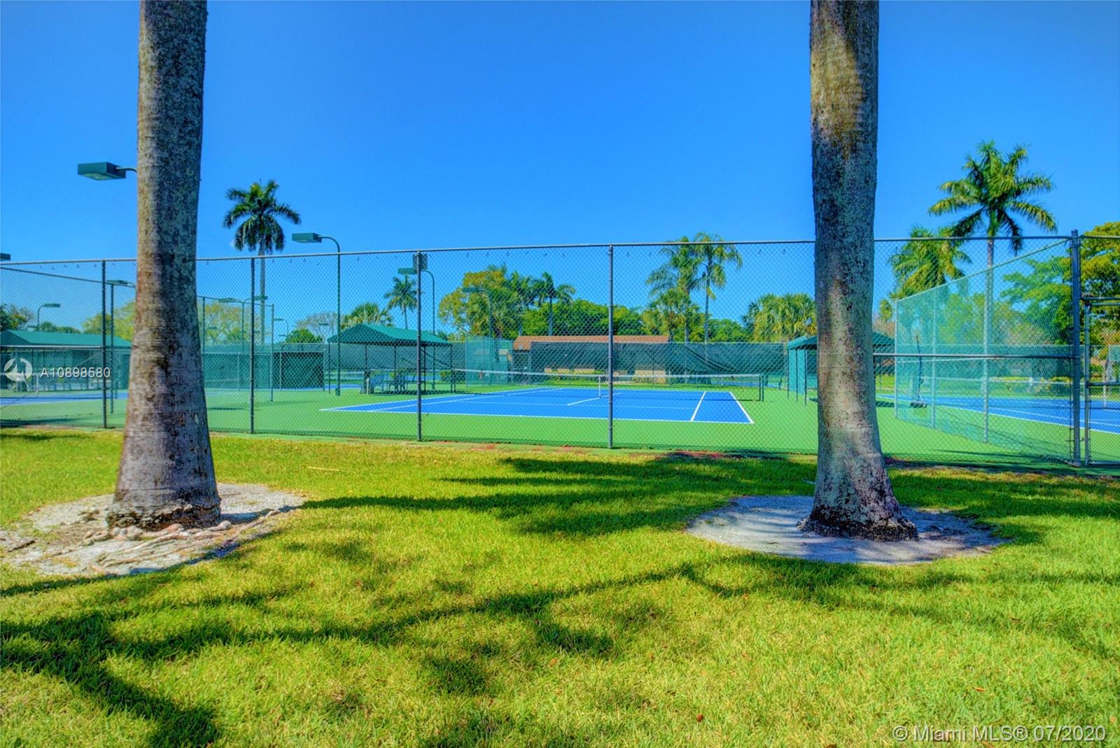 8617 Sunbird Place, Unit B Boca Raton, FL 33496 - Photo 32 of 41 a view of a park with a big yard