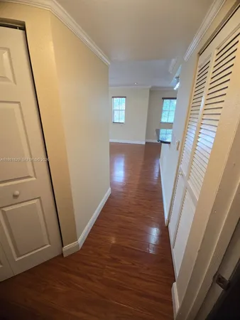a view of entryway with wooden floor