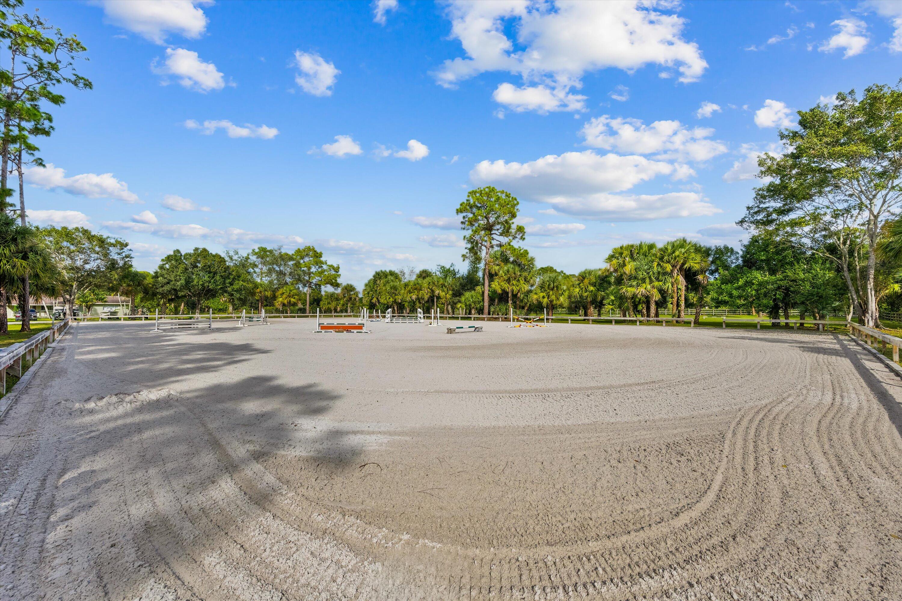 3509 C Road, Unit BARN Loxahatchee Groves, FL 33470 - Photo 6 of 12 a view of a swimming pool and an outdoor space