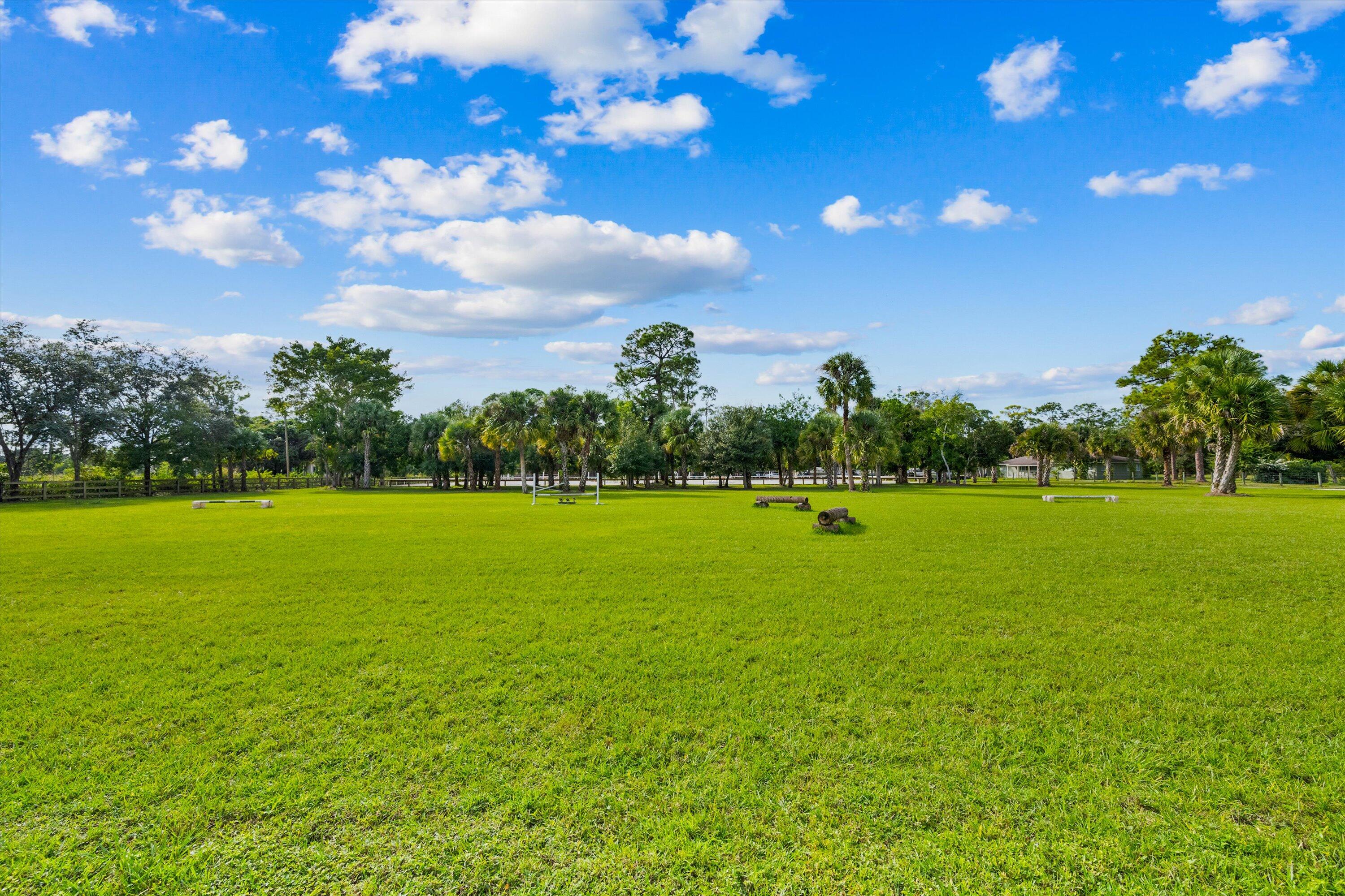 3509 C Road, Unit BARN Loxahatchee Groves, FL 33470 - Photo 7 of 12 a view of a green field