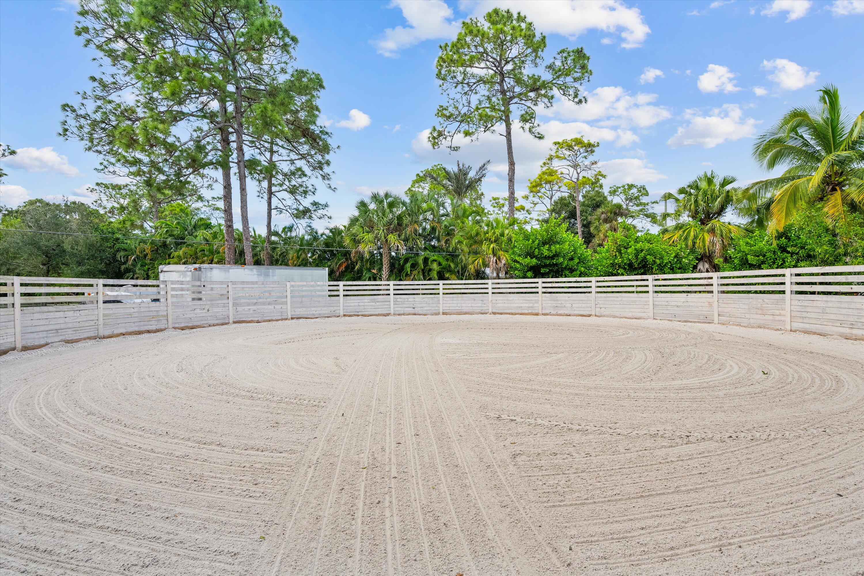 3509 C Road, Unit BARN Loxahatchee Groves, FL 33470 - Photo 9 of 12 a view of a tennis court