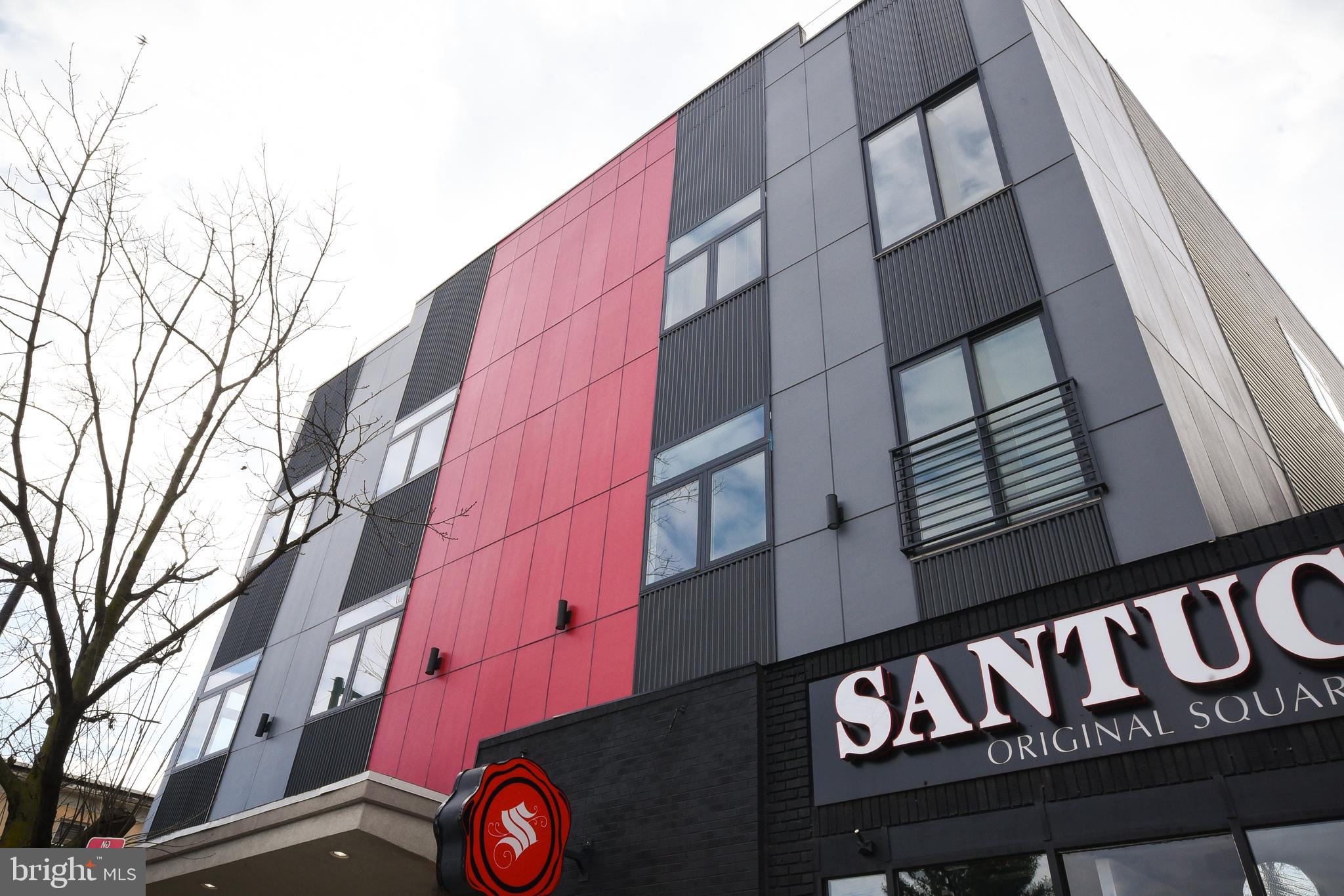 6164-66 Ridge Avenue, Unit 301 Philadelphia, PA 19128 - Photo 1 of 8 a front view of a building