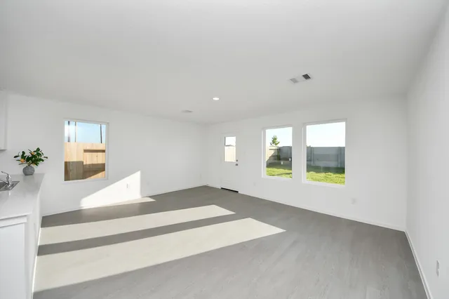 a view of an empty room and window