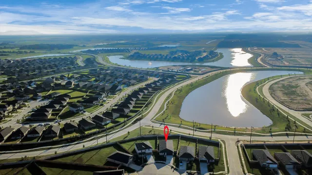 a view of swimming pool with furniture