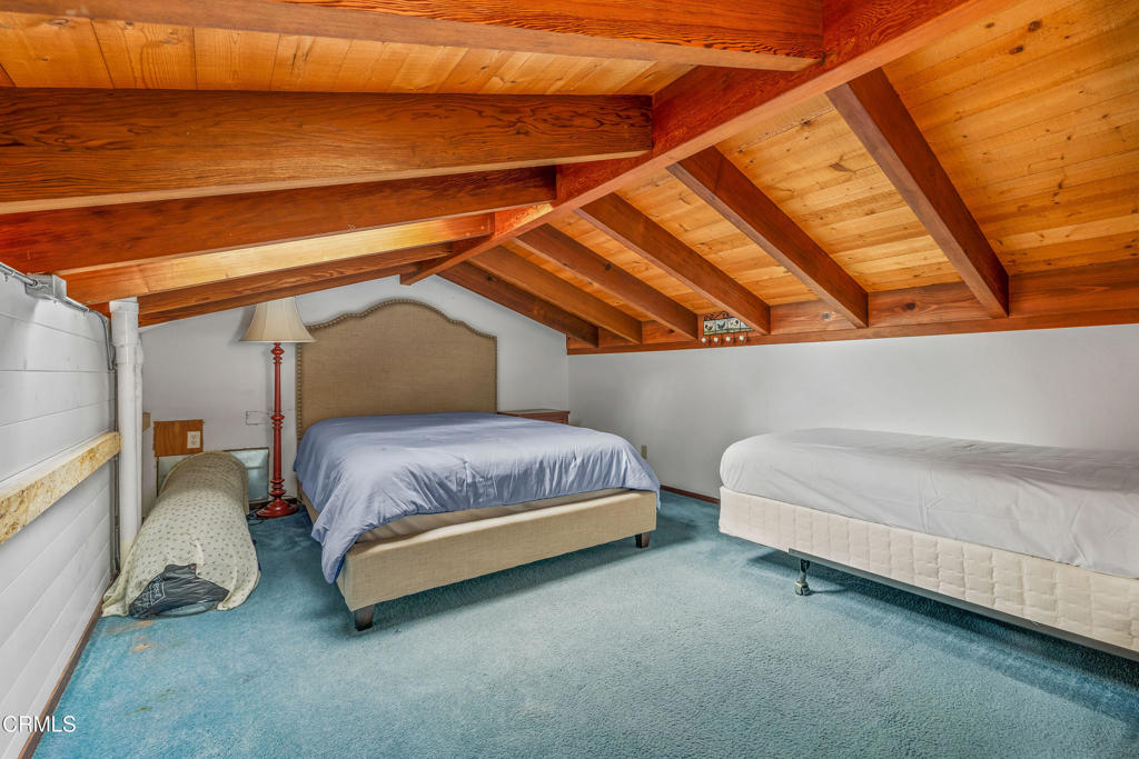 32450 Simpson Lane Fort Bragg, CA 95437 - Photo 24 of 54 a bedroom with a bed and a window