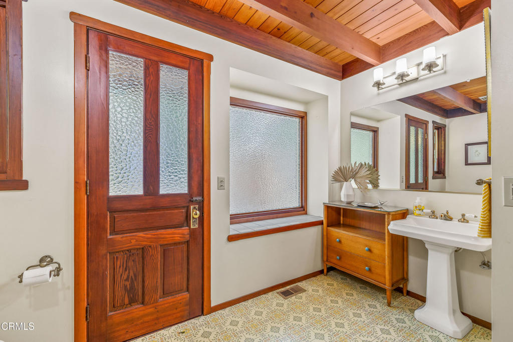 32450 Simpson Lane Fort Bragg, CA 95437 - Photo 26 of 54 a kitchen with a refrigerator and cabinets