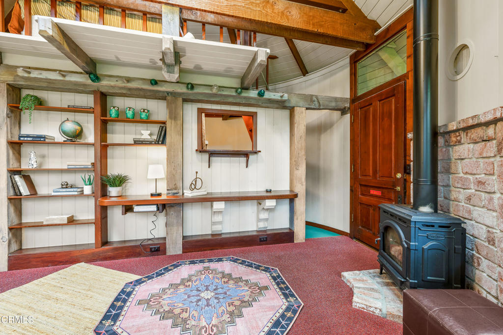 32450 Simpson Lane Fort Bragg, CA 95437 - Photo 33 of 54 a bed sitting in a room next to a window