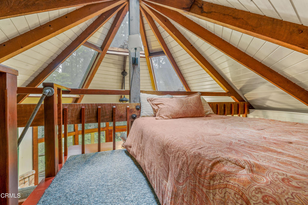 32450 Simpson Lane Fort Bragg, CA 95437 - Photo 35 of 54 a bedroom with a bed and a large window