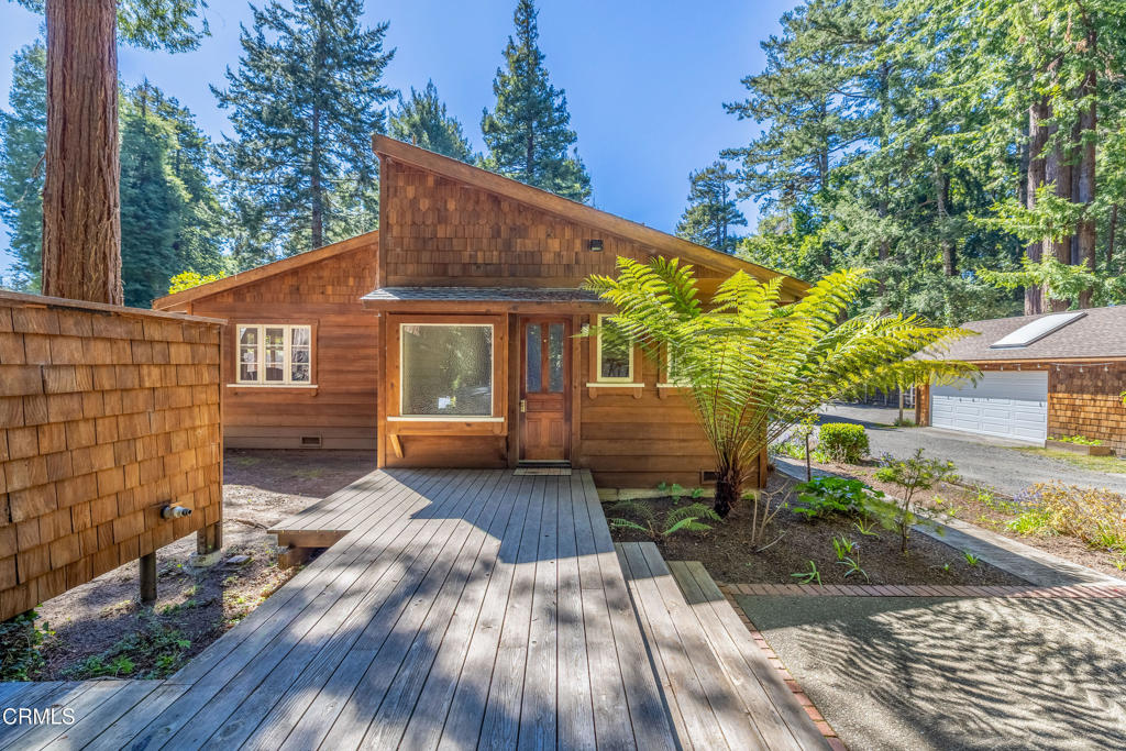 32450 Simpson Lane Fort Bragg, CA 95437 - Photo 37 of 54 a view of a house with a yard