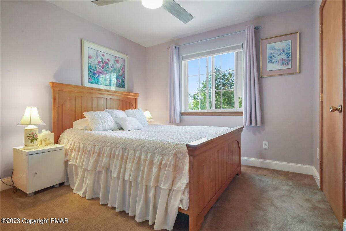 105 Alford Court Bushkill, PA 18324 - Photo 31 of 64 a bedroom with a bed and a window