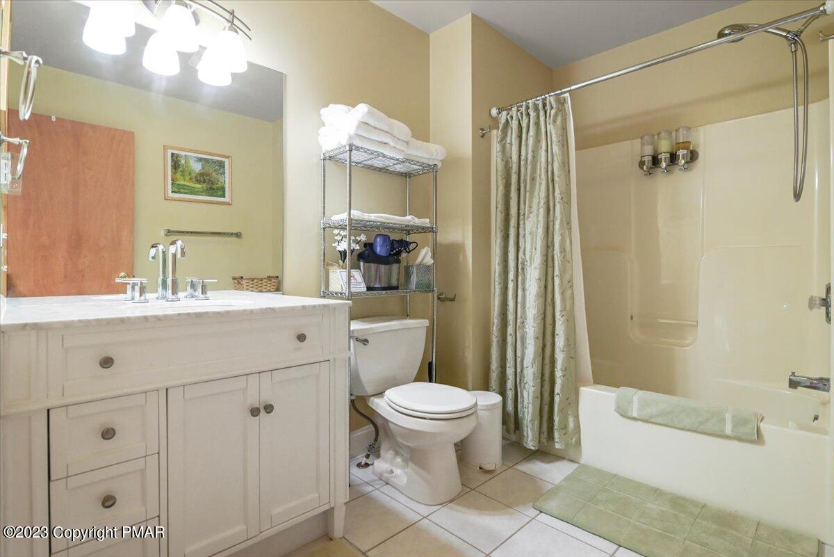 105 Alford Court Bushkill, PA 18324 - Photo 39 of 64 a bathroom with a sink a toilet and shower