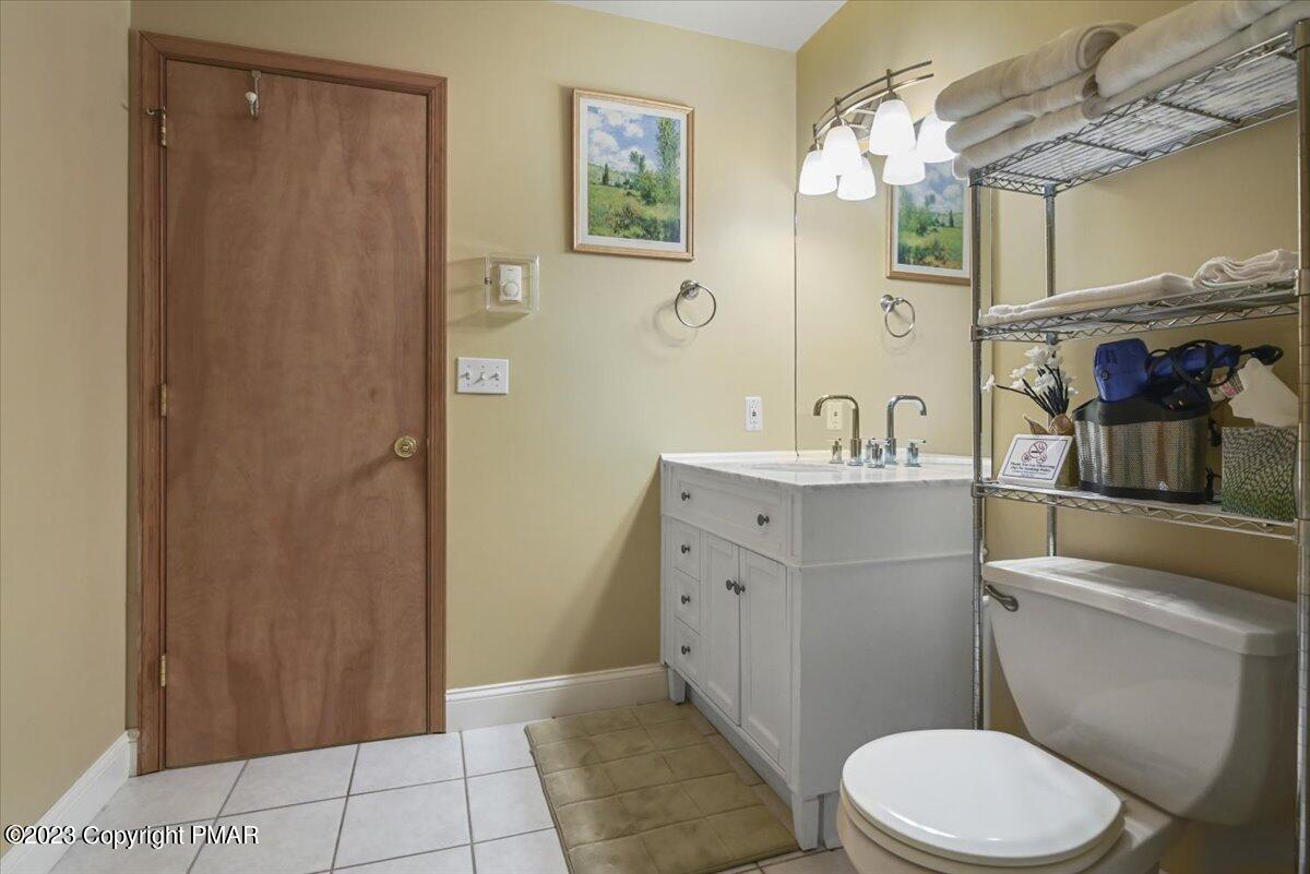 105 Alford Court Bushkill, PA 18324 - Photo 40 of 64 a bathroom with a sink a toilet and shower