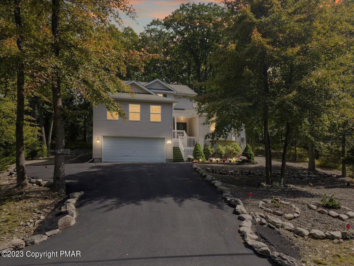 105 Alford Court Bushkill, PA 18324 - Photo 4 of 64 a front view of a house with yard