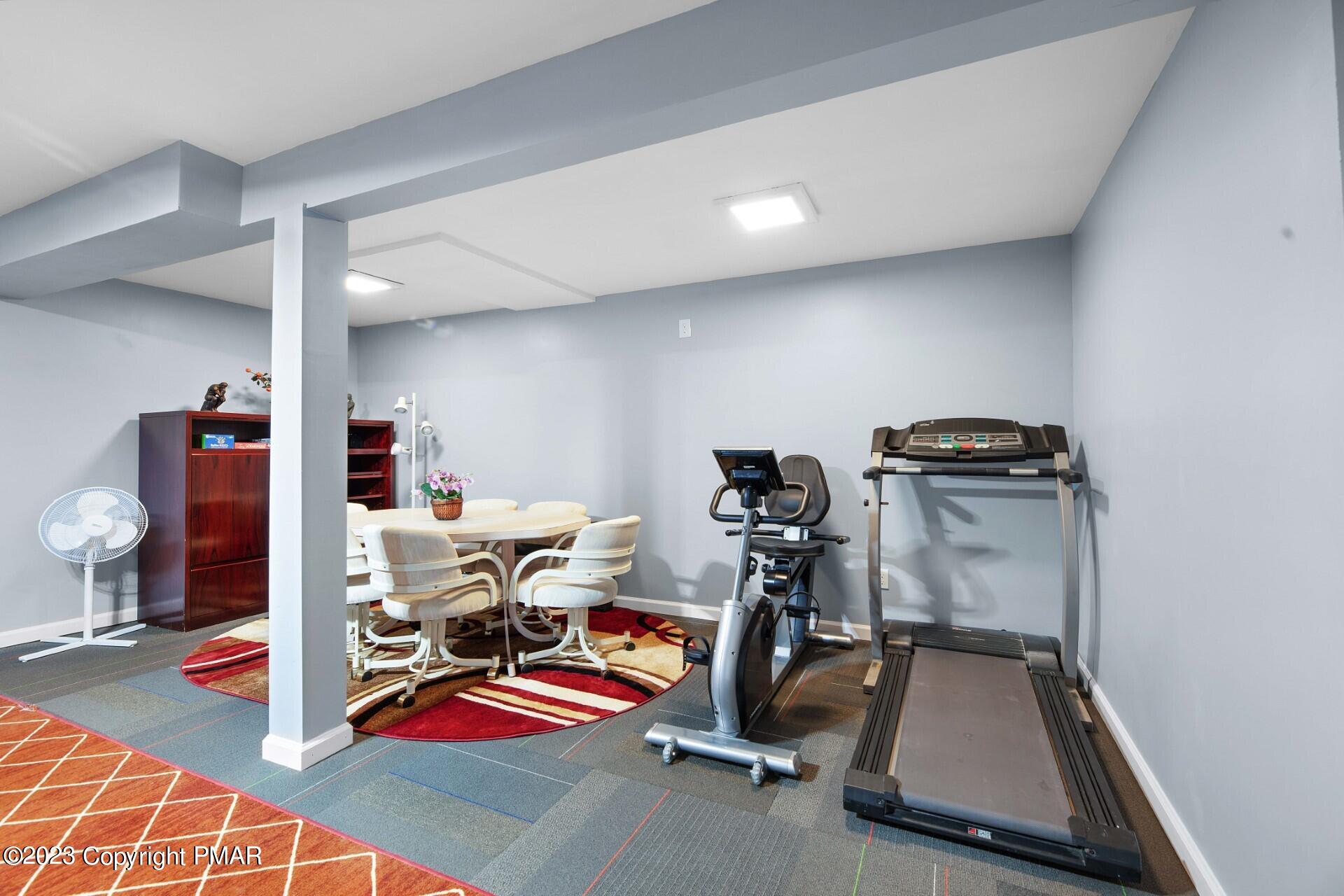 105 Alford Court Bushkill, PA 18324 - Photo 45 of 64 a view of a room with gym equipment