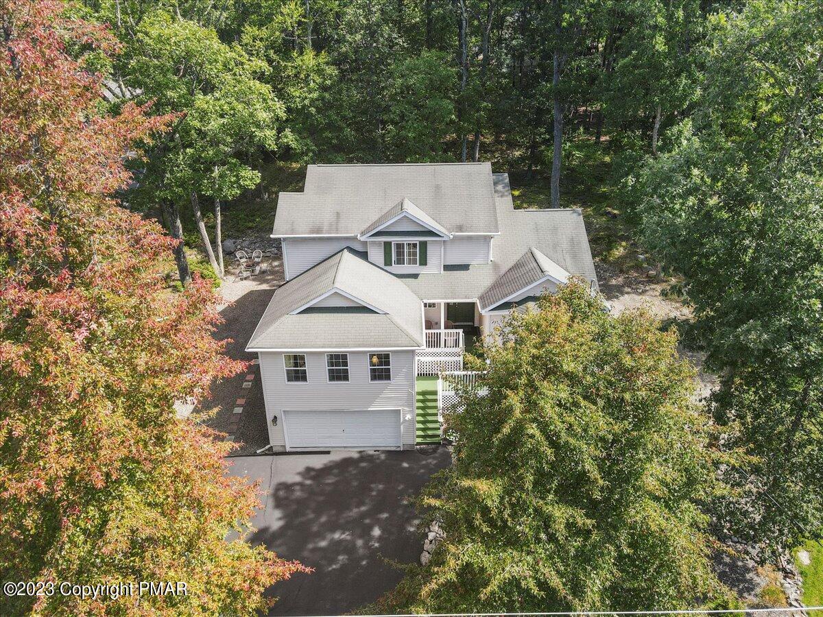 105 Alford Court Bushkill, PA 18324 - Photo 52 of 64 front view of a house with a yard
