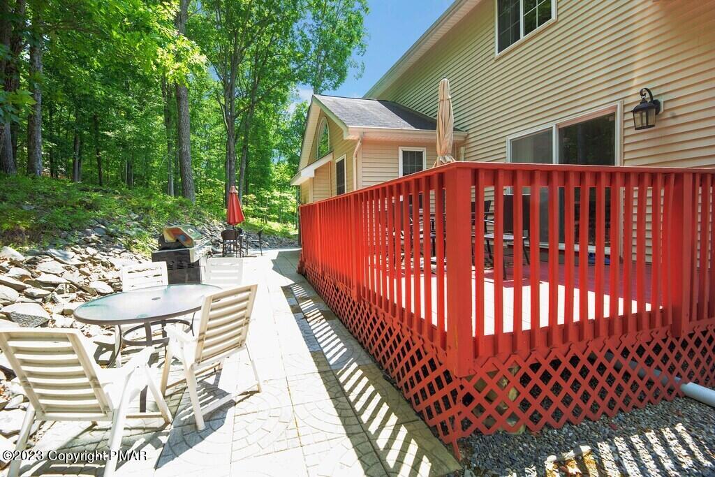 105 Alford Court Bushkill, PA 18324 - Photo 57 of 64 a view of a house with backyard and sitting area