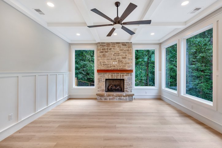 1422 Hunters Trail Anderson, SC 29625 - Photo 16 of 41 Elegant living space featuring a stone fireplace and abundant natural light.