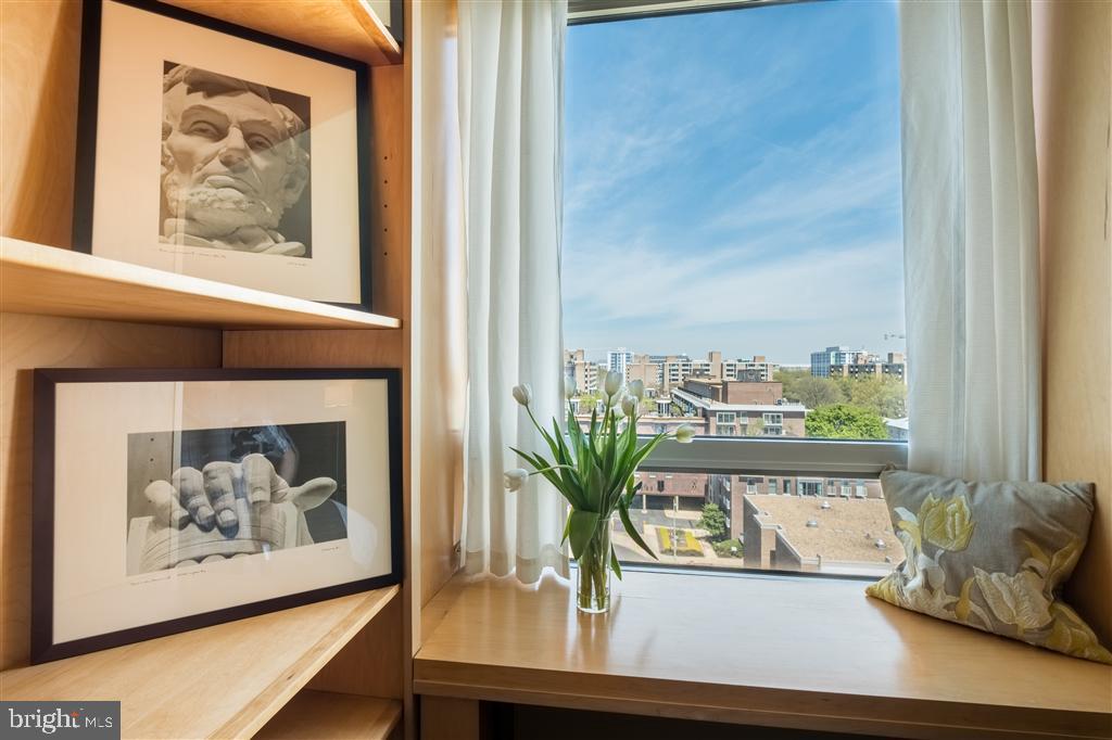 1425 4th Street Southwest, Unit A801 Washington, DC 20024 - Photo 5 of 19 a view of a living room with a large window with a flower pot