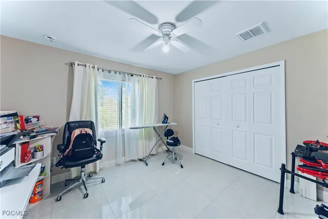 a view of workspace with gym equipment