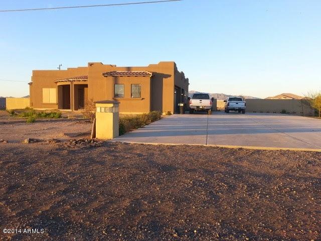 22630 West Beverly Road Buckeye, AZ 85326 - Photo 3 of 23 a view of a house with a yard