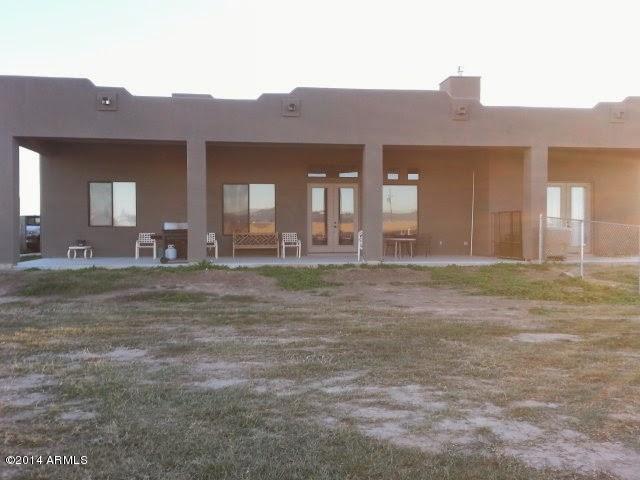 22630 West Beverly Road Buckeye, AZ 85326 - Photo 5 of 23 a view of a house and a outdoor space