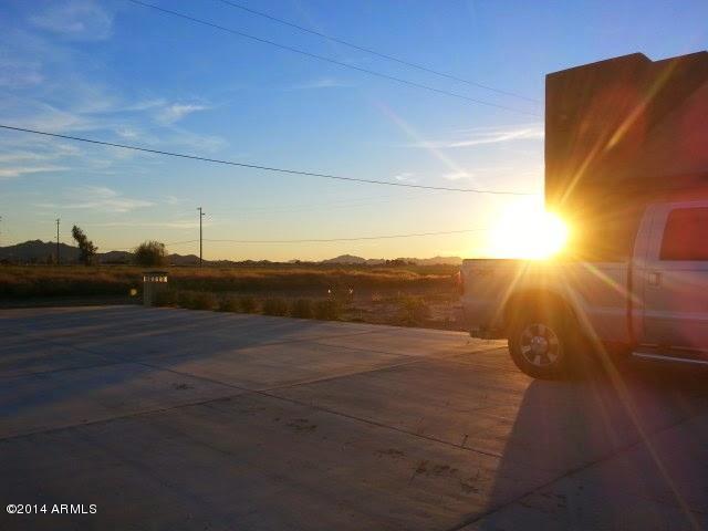 22630 West Beverly Road Buckeye, AZ 85326 - Photo 6 of 23 a view of an ocean from a balcony