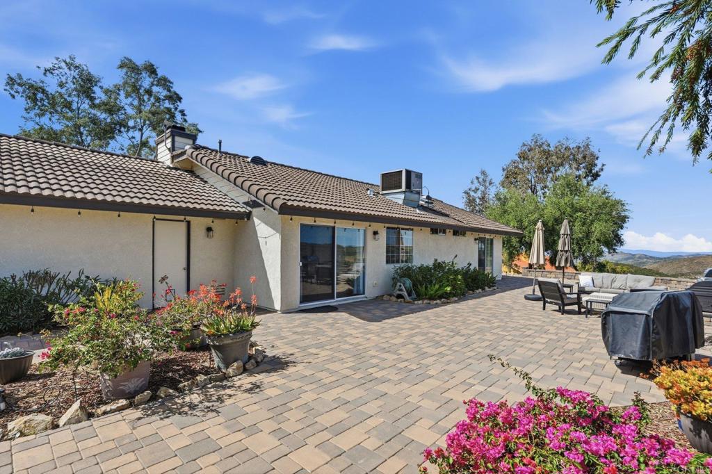 37875 Sage Road Hemet, CA 92544 - Photo 19 of 33 a front view of a house with a garden