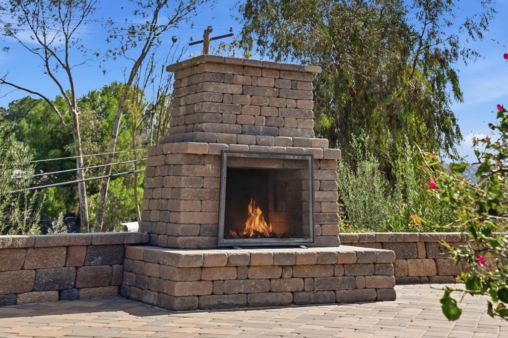 37875 Sage Road Hemet, CA 92544 - Photo 20 of 33 a living room with a couch and a fireplace