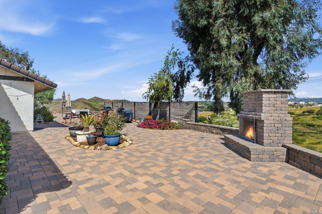 37875 Sage Road Hemet, CA 92544 - Photo 21 of 33 a view of a backyard with sitting area