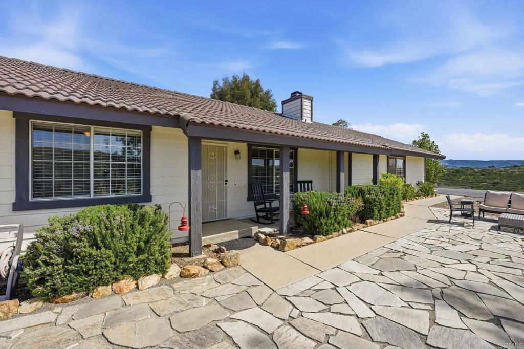 37875 Sage Road Hemet, CA 92544 - Photo 3 of 33 a front view of a house with chairs